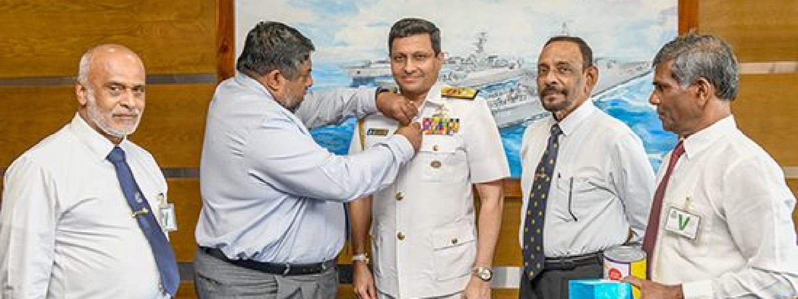 Poppy flower pinned on Navy Chief